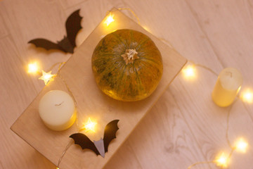 Halloween pumpkins, bats, candles and the lanterns