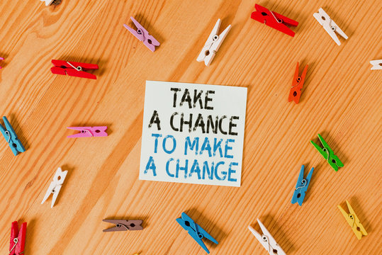 Writing Note Showing Take A Chance To Make A Change. Business Concept For Dont Lose Opportunity To Reach Bigger Things Colored Clothespin Papers Empty Reminder Wooden Floor Background Office