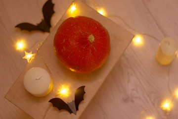 Halloween pumpkins, bats, candles and the lanterns