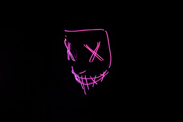 Pink Halloween mask with black background