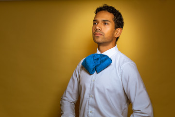 Obraz premium Charro Mexican young man dressed in typical custom Mariachi White Blue Yellow