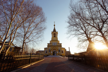 Fototapeta premium Large expeditionary tourist cars drive along a dirt road.