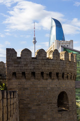 View of Flame Towers from Icheri Sheher, Old Town Baku. Historic city center at capital of Azerbaijan.