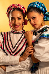 Mexican adelitas Young gay couple lesbian love hug  culture costume typical white