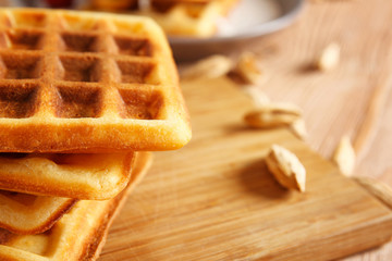 Tasty waffles on table, closeup