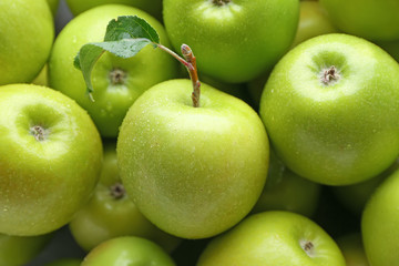 Many fresh ripe apples as background