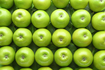 Many fresh ripe apples as background