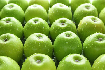 Many fresh ripe apples as background