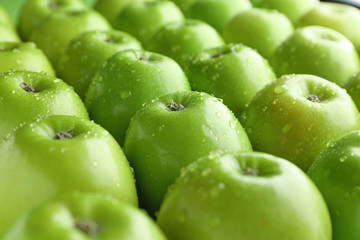Many fresh ripe apples as background