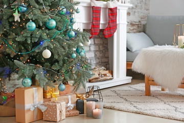 Interior of room with beautiful decorated Christmas tree