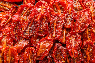 Many dried tomatoes as background