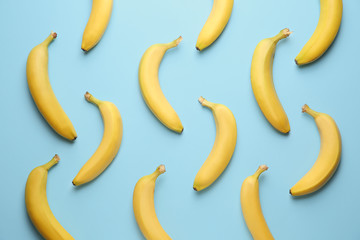 Ripe bananas on color background © Pixel-Shot