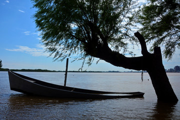 Sinking boat on Guaiba river in Porto Alegre, Rio Grande do Sul, Brazil