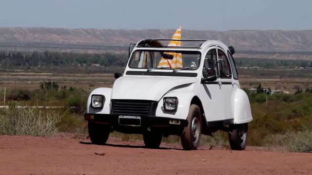 Old White Car on the Road.