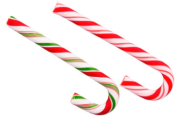 Duo of candy cane, traditional treat of Christmas. Cut out, isolated on a white background.