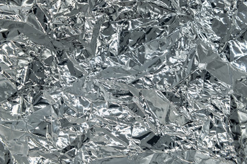 Abstract background texture silver color crumpled foil