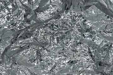Abstract background texture silver color crumpled foil