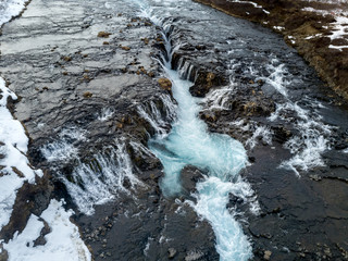 Arial view of Bruarfoss Waterfall in Iceland by far has the most blue water of all the waterfalls on the Golden Circle.