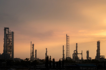 Oil refinery plant in morning sunrise for your work .