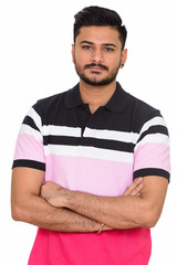 Young handsome Indian man isolated against white background