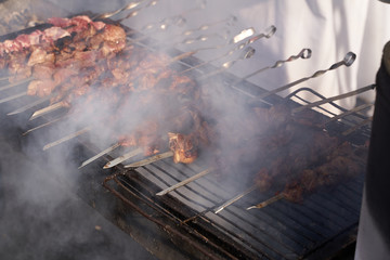 Shish kebab. Pork or lamb meat pieces being fried on a charcoal grill.