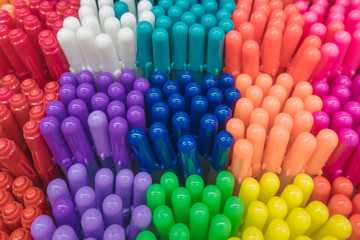 Close up on top view on variety of many colorful pens are in box on shelf stack sale point are in box at stationery store.