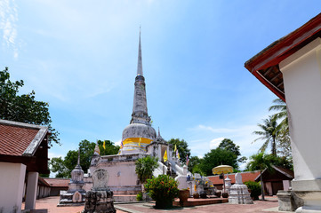 Fototapeta premium Phra Mahathat Chedi for Thai people visit and respect praying at Wat Kiean Bang Kaew in Khao Chaison District of Phatthalung, Thailand