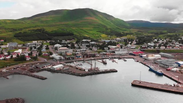 Aerial view of Húsavík in Iceland. Icelandic port city landscape top drone shot footage 4K (UHD)