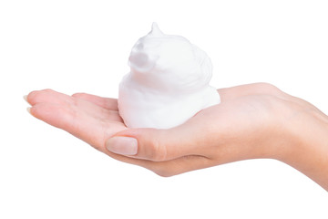 White foam on a female hand