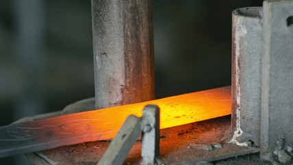 Forge workshop on table. Smithy manual production. Work on the product. Ruler, angle grinder. The blacksmith manufacture of fireplaces, stoves.
