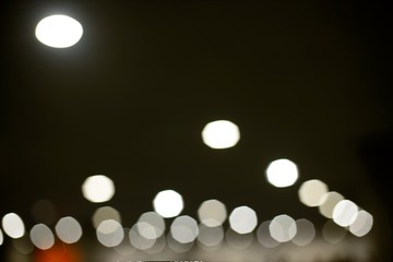 Pleasant, soft background city or hall lights with bokeh and lens flare