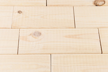 Stack of small planks on grey background