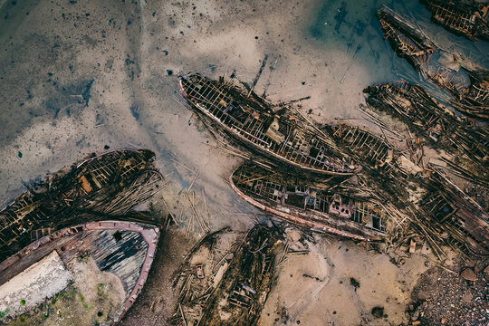 Cemetery of old ships in Teriberka Murmansk Russia, dramatic photo. Aerial top view