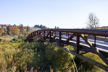 Fototapeta na wymiar Wooden foot bridge built for nature park
