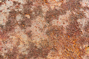 Texture of a concrete wall with cracks and scratches which can be used as a background