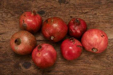 Fototapeta na wymiar pomegranate fruits on wooden table.