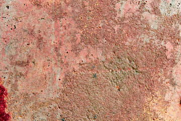 Texture of a concrete wall with cracks and scratches which can be used as a background