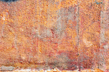 Texture of a concrete wall with cracks and scratches which can be used as a background