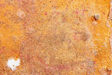 Texture of a concrete wall with cracks and scratches which can be used as a background