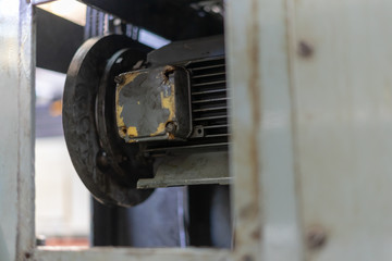 Repair of old metal lathe machine for metalworking closeup in workshop