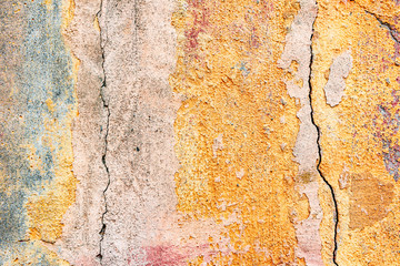 Naklejka premium Texture of a concrete wall with cracks and scratches which can be used as a background