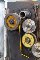 Repair of old metal lathe machine for metalworking closeup in workshop