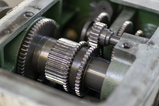 Preventive machine maintenance and retrofit in machine shop.Spindle shaft gear and bearing, parts in head stock of lathe machine.