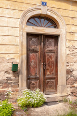 Fototapeta na wymiar Old wooden door at Mladotice in the Pilzen region, CZ