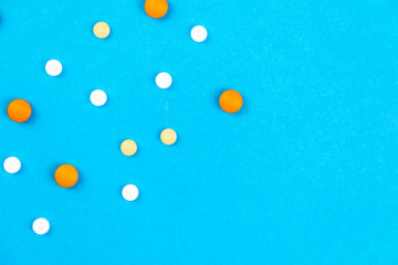 Tablets medicaments on a blue background