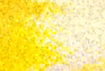 Light Yellow vector backdrop with hexagons.