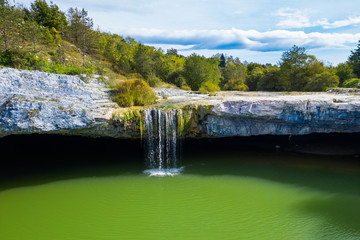Beautiful small waterfall Zarecki Krov on Pazincica River near Pazin in Istria, Croatia