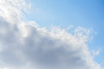 Beautiful puffy clouds isolated against blue skies