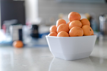Fresh mandarin oranges fruit in a bowl