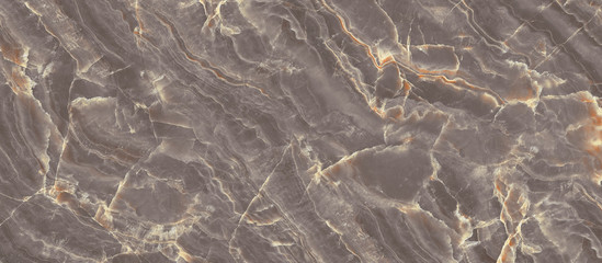 Natural marble stone texture background with yellow curly veins, Brown colored marble for interior-exterior home decoration and ceramic tile surface, Quality stone texture with deep veins.
